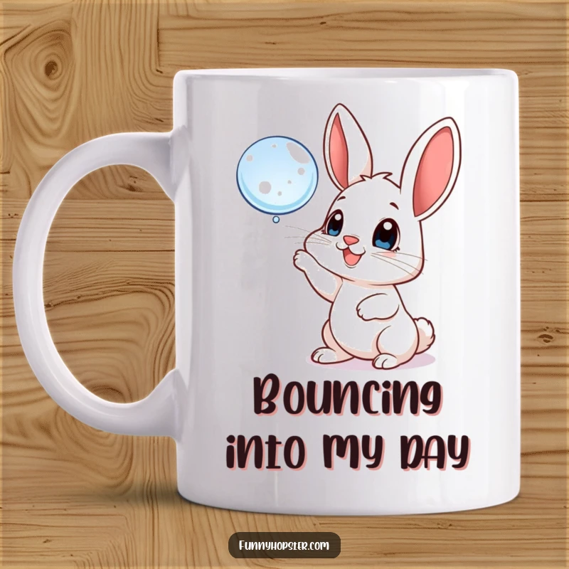 Funny mug featuring a playful rabbit with big, happy eyes batting at a floating bubble, embodying innocent delight and fun.