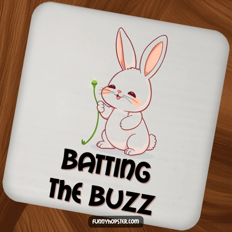 Funny coaster featuring a rabbit character playfully batting at a floating dandelion seed, adding charm to surfaces.