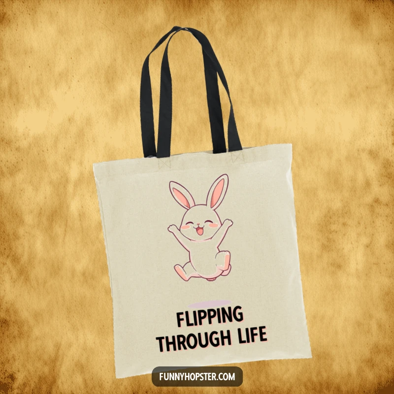 Funny tote bag depicting a rabbit joyfully doing a somersault with its legs raised in the air, symbolizing playful movement.