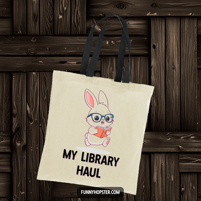 Funny tote bag with a fluffy rabbit sporting glasses and a book, caught mid-hop, showcasing a love for knowledge and jokes.